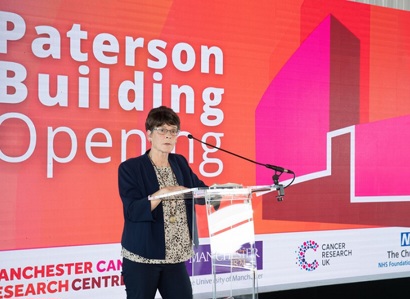 A photo of Christie patient Adele Adams speaking at the opening of the Paterson Building at The Christie.