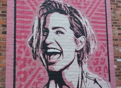 A photo of the pink Sarah Harding mural.