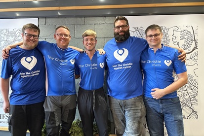 A photo of Taylor West and 4 other male fundraisers wearing Christie Charity t-shirts.