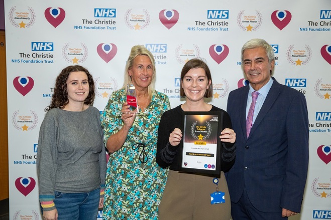 A photo of the head and neck cancer AHP team at The Christie receiving their Christie Colleague Award from Christie Non-executive Director Tarun Kapur.