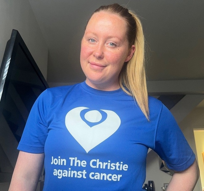 A photo of Christie fundraiser Leonie Kerr wearing a blue t-shirt reading 'Join The Christie against cancer'.