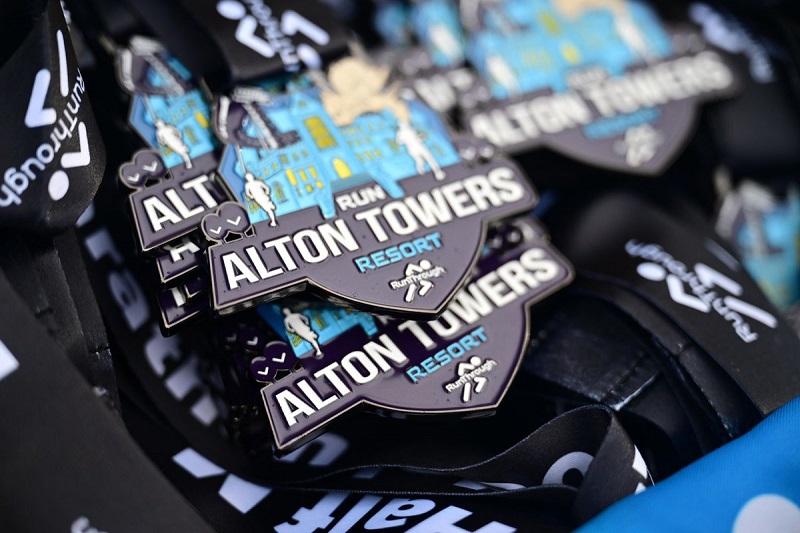 A photo of a collection of the Run Alton Towers medals.