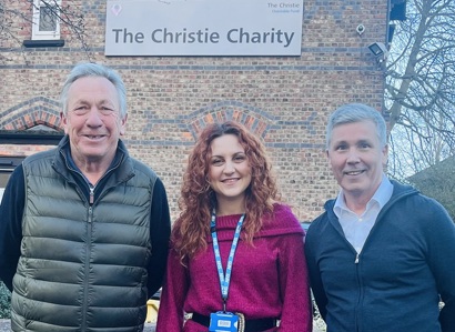 A photo of Mike Rooney, Dr Eleni Vrana and Nigel Tobias outside The Christie Charity building.