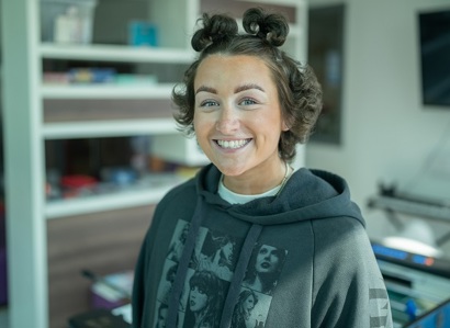 A photo of Christie patient Claudia Boardman wearing a Taylor Swift hoodie.