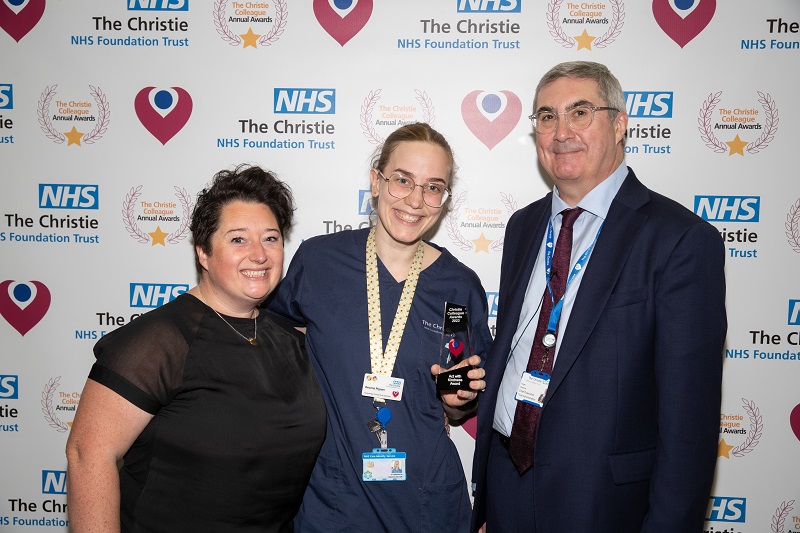 A photo of Christie patient Maxine Roscoe, nurse Decima Pigram and chief executive Roger Spencer.